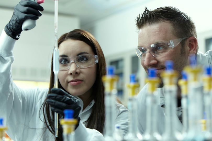 Scientists performing research